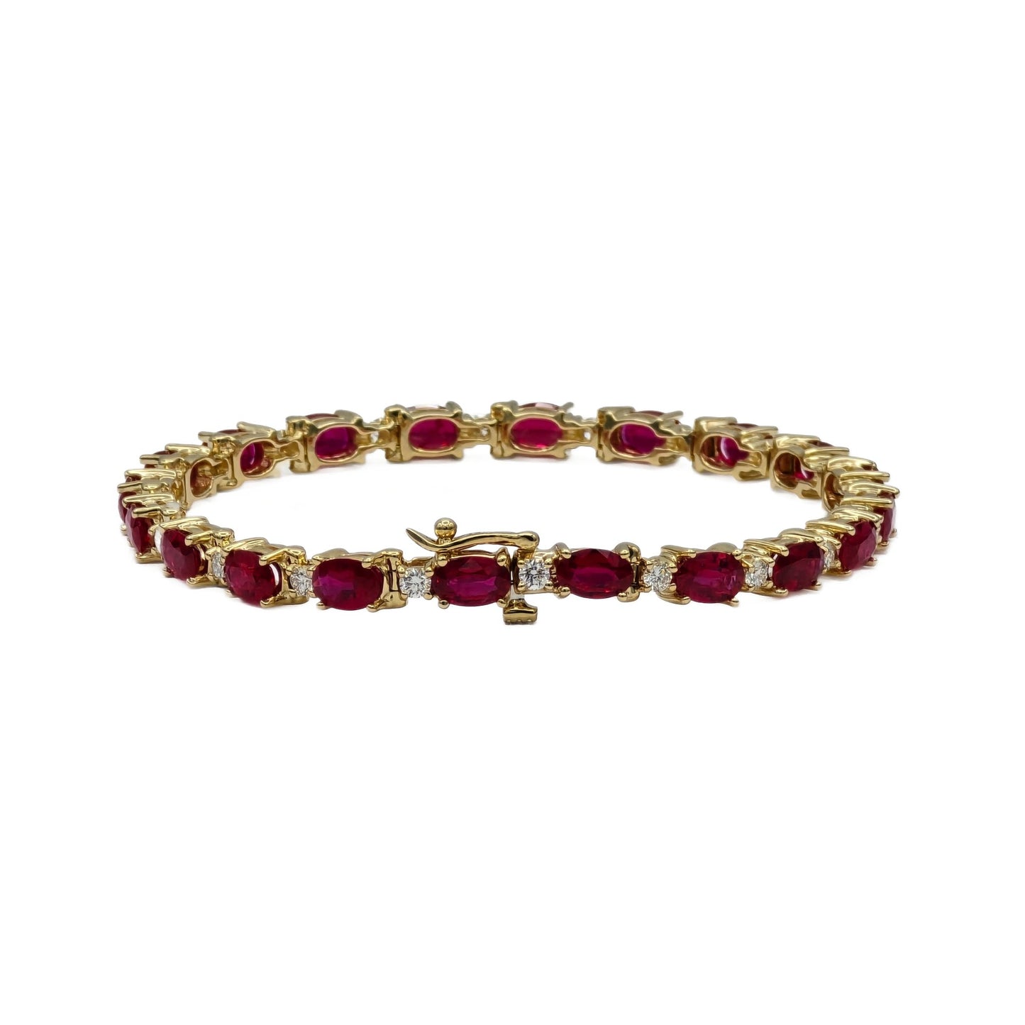 9.11 Carat total weight ruby and diamond bracelet in 14K yellow gold