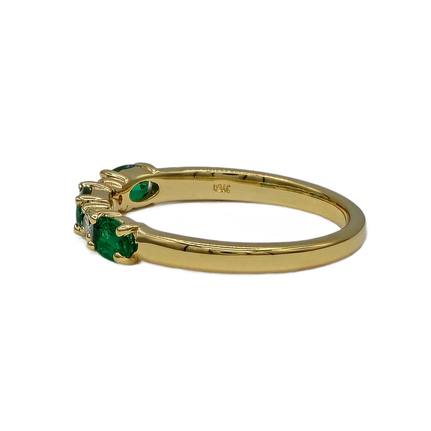 0.63 Carat Oval Emerald and 0.09 Carat Round Diamond Ring in 18K Yellow Gold