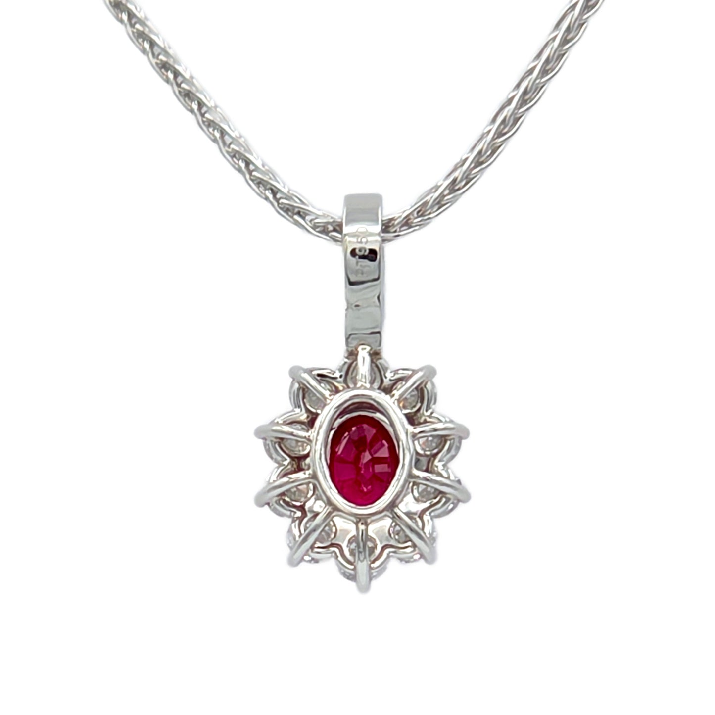 Back view of ruby and diamond pendant with GIA report