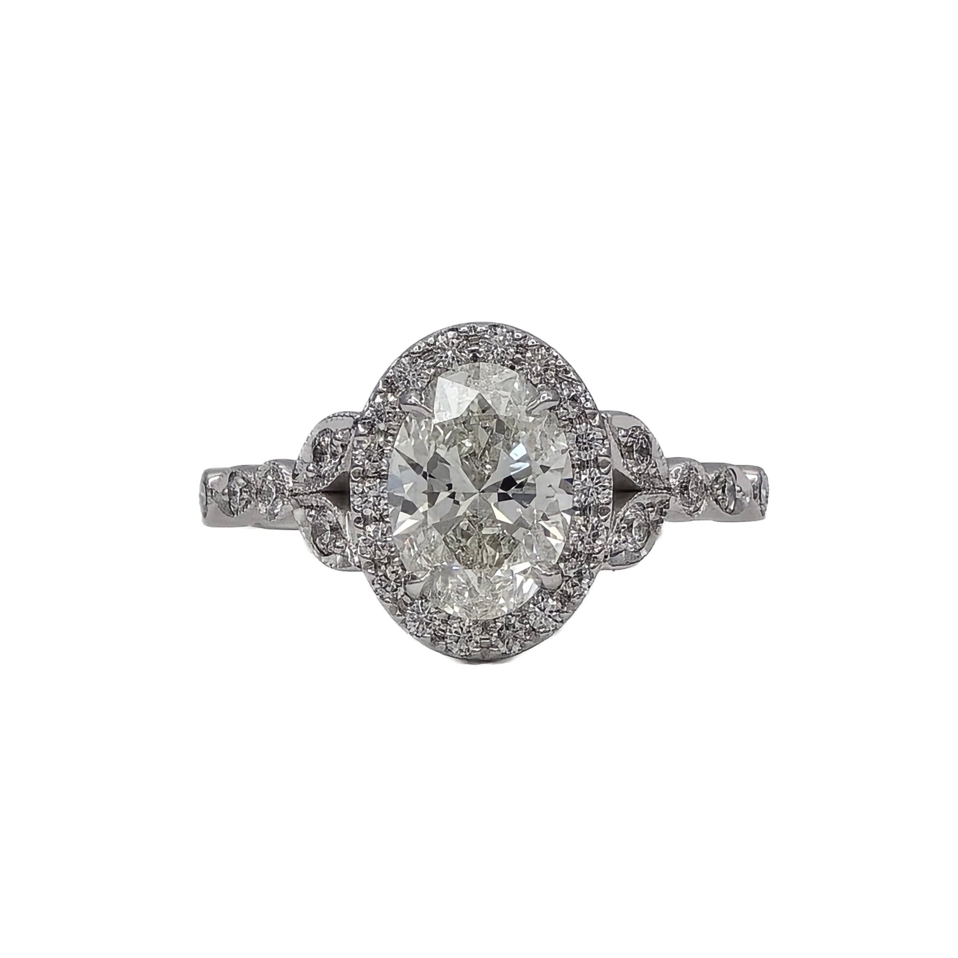 1.50 Carat Oval Halo Diamond ring in 18K white gold