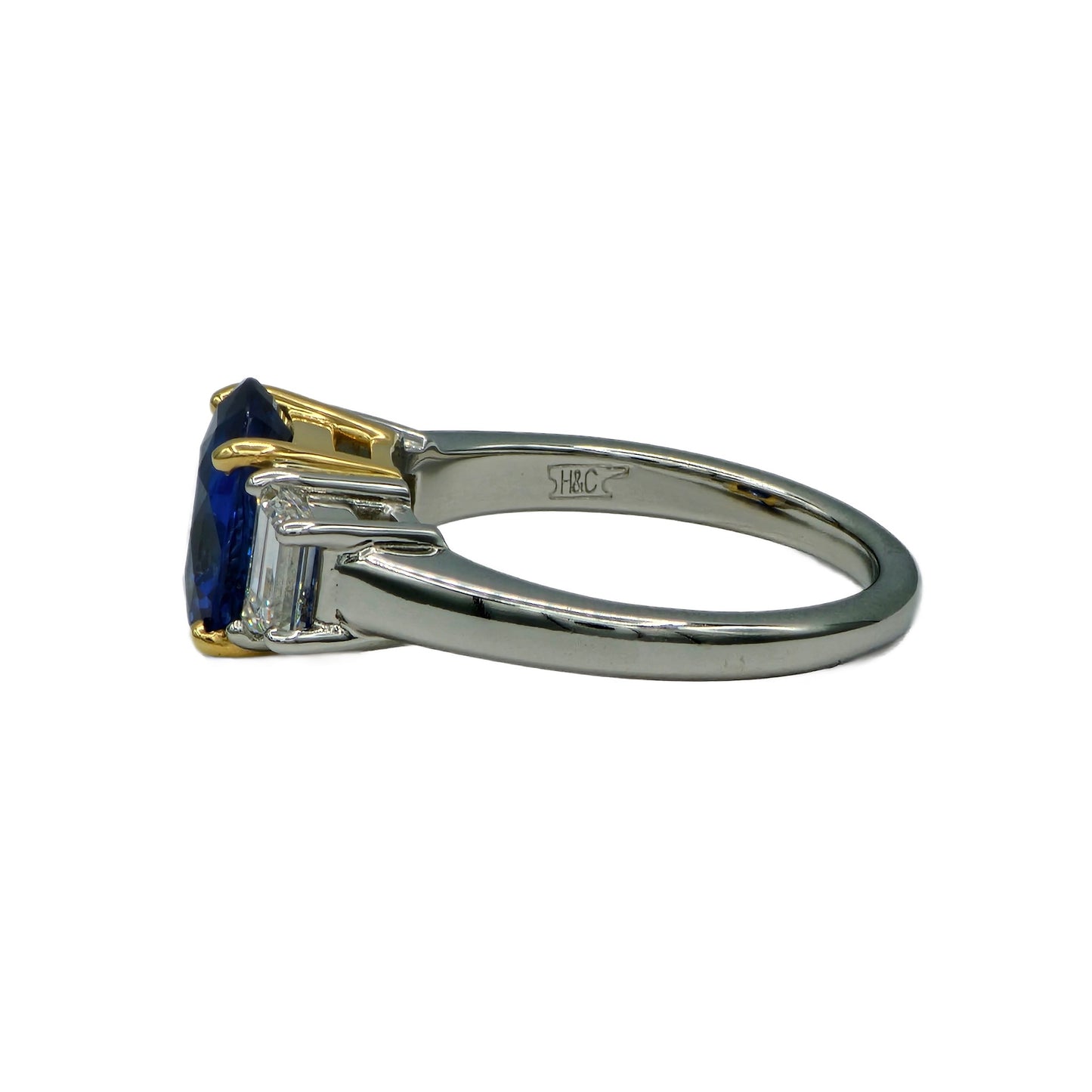 3.06 Carat Oval Blue Sapphire and 2=0.88 Carat Trapezoid Diamond Ring in Platinum