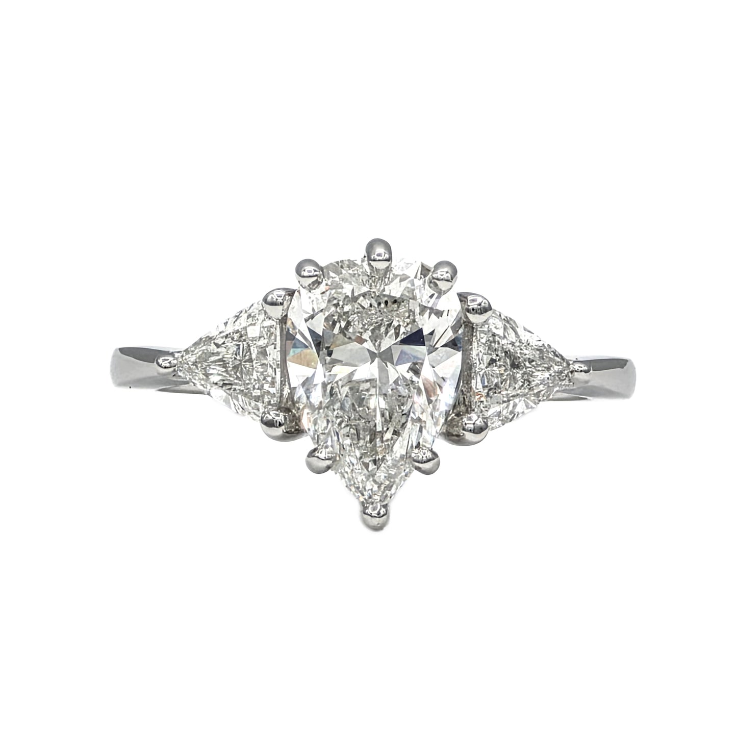 1.85Ct Pear Shape Diamond and trillion 3 stone ring in Platinum