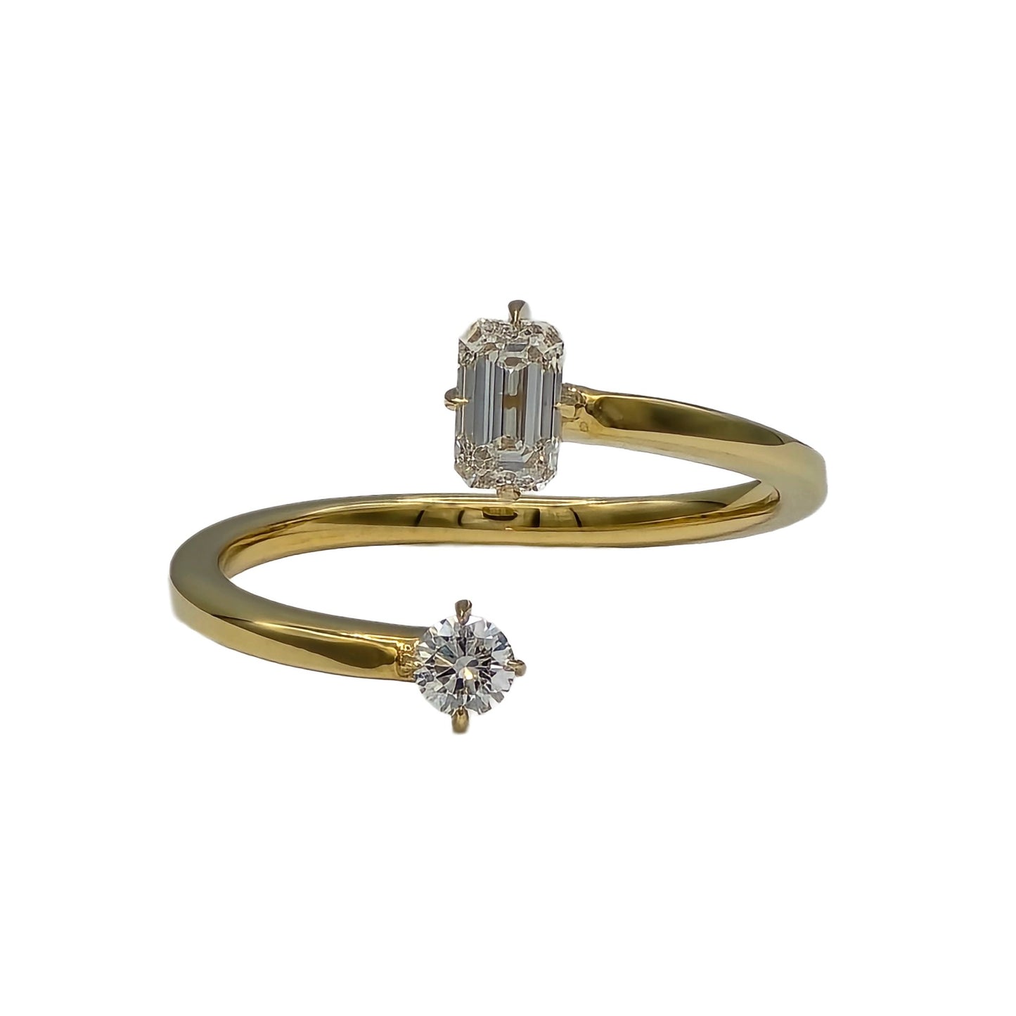 14K yellow gold ring with an emerald cut and round brilliant cut diamond