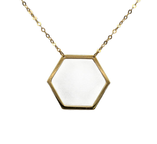14K Yellow Gold hexagonal pendant necklace on a white background
