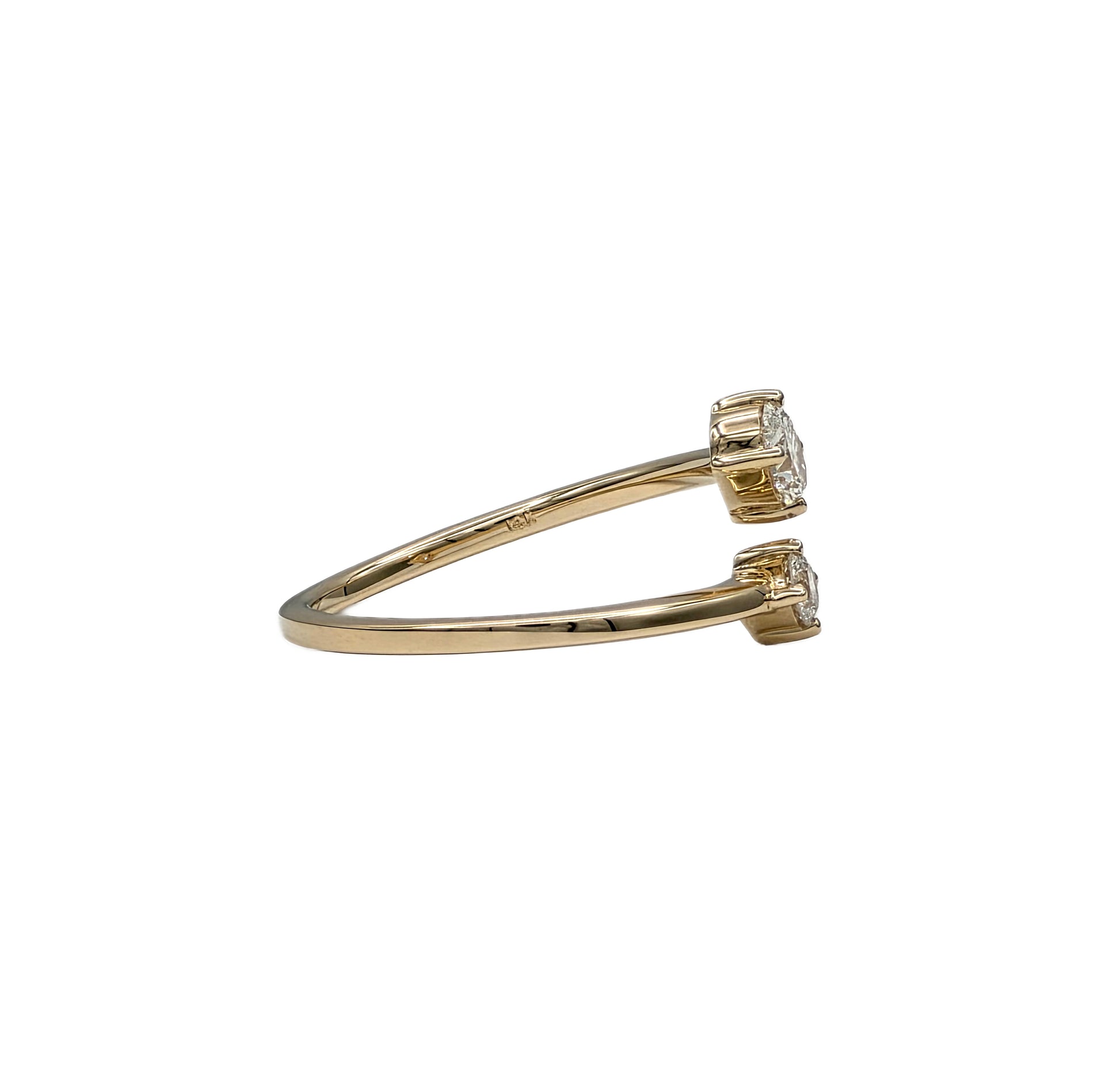 Oval and round diamond bypass ring in 14K yellow gold
