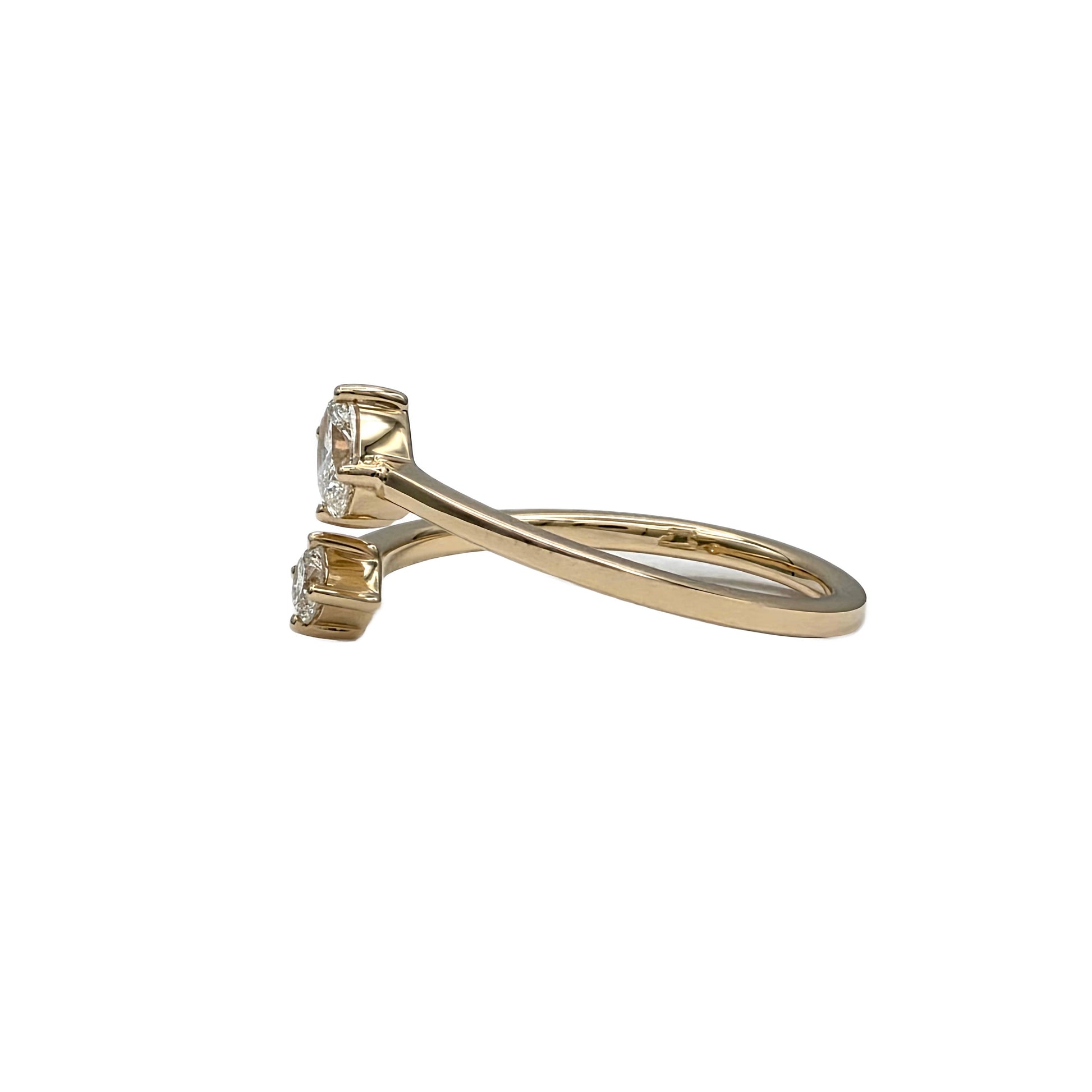 Oval and round diamond bypass ring in 14K yellow gold