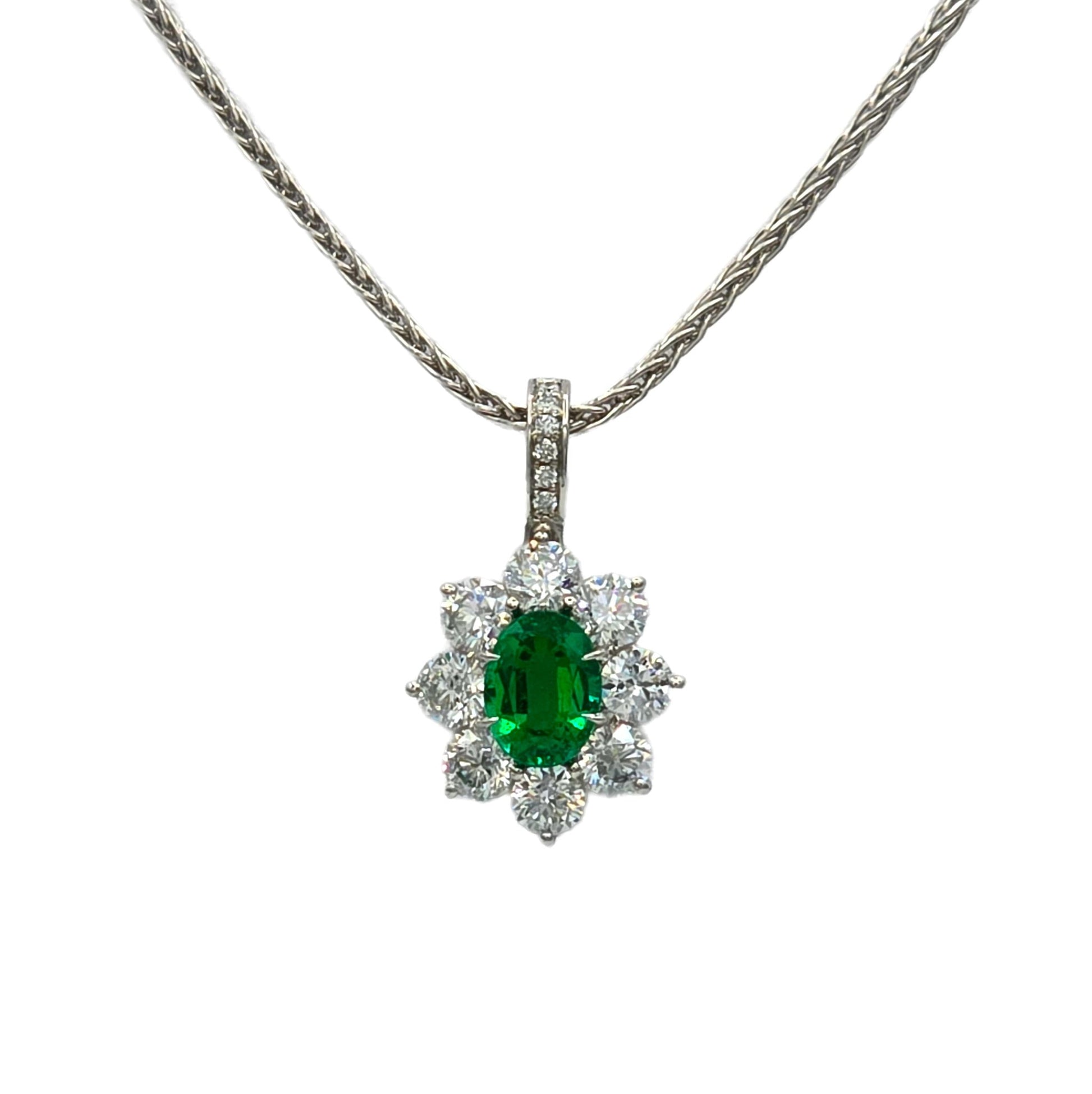 1.34 Carat Oval Emerald an diamond handmade pendant in platinum
