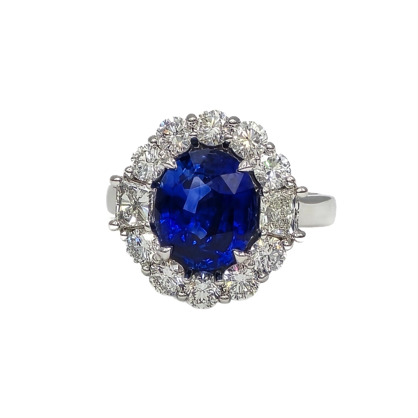 5.04 Carat oval sapphire and diamond ring in 18k white gold
