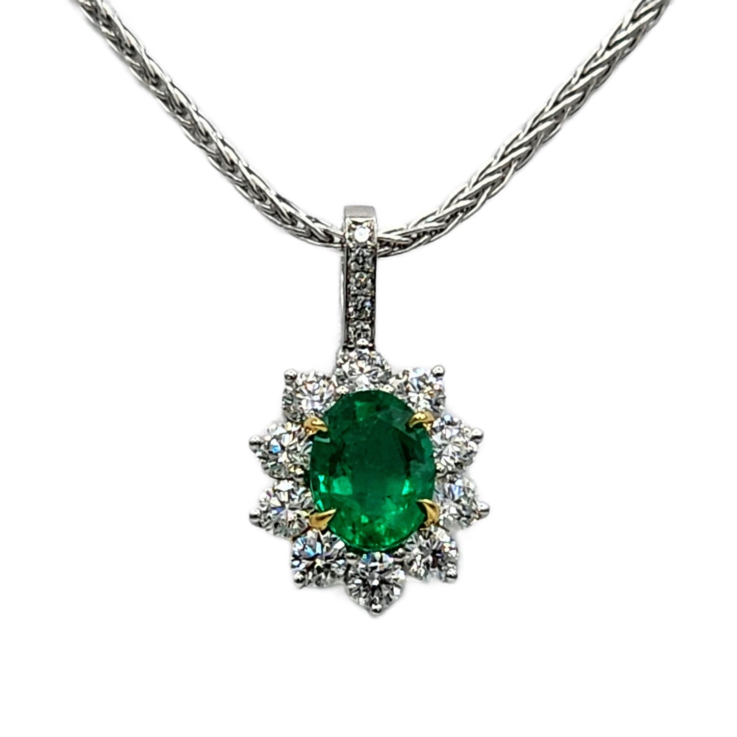 1.53 Carat Oval Emerald and 15=1.17 Carat Diamond Pendant Handmade in Platinum