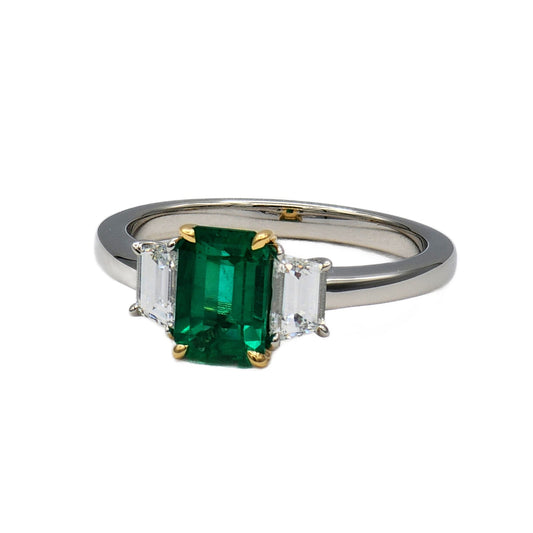1.10 Carat Emerald Cut Emerald and 2=0.58 Trapezoid Diamond Ring in Platinum and 18K