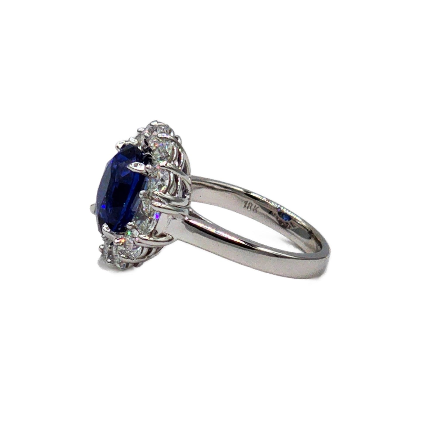 5.04 Carat Blue Sapphire and 2.02 Carat Total Weight Diamond Ring in 18K